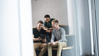 Three people with a Tablet